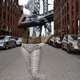 Illustration for article titled Womens bodies blend into a citys background with just bodypaint